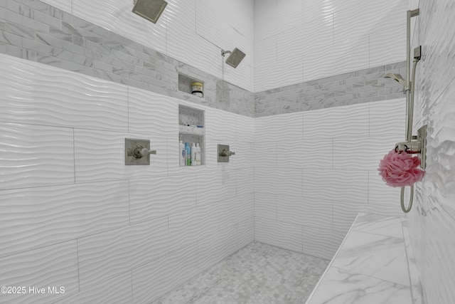 732 Avila Ave, Hampstead, NC 28443 - bathroom with a tile shower and marble finish flooring