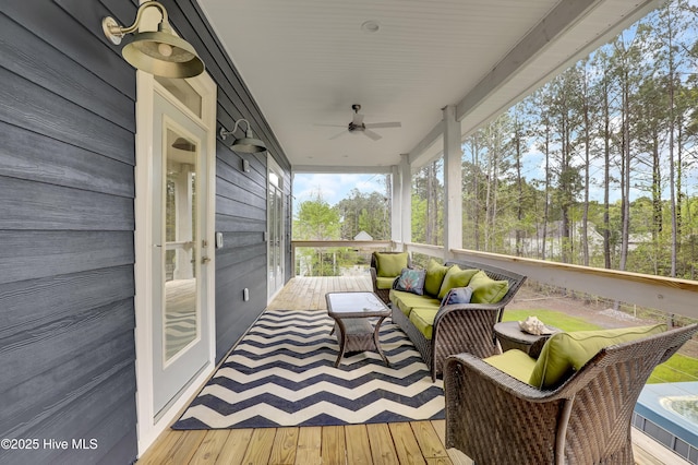 732 Avila Ave, Hampstead, NC 28443 - sunroom / solarium with an outdoor living space and a ceiling fan