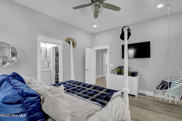 732 Avila Ave, Hampstead, NC 28443 - bedroom featuring wood finished floors, recessed lighting, a ceiling fan, ensuite bath, and baseboards
