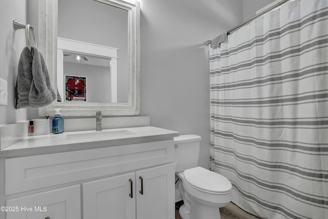 732 Avila Ave, Hampstead, NC 28443 - bathroom featuring vanity, toilet, and a shower with curtain