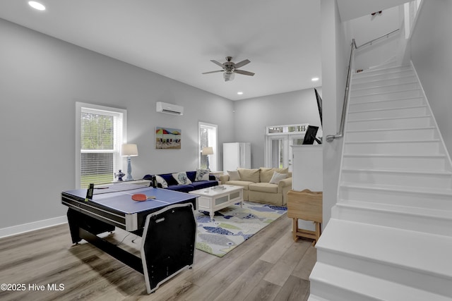 732 Avila Ave, Hampstead, NC 28443 - rec room with a wall mounted air conditioner, light wood-style floors, plenty of natural light, ceiling fan, and recessed lighting