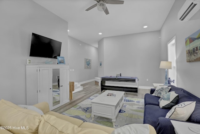732 Avila Ave, Hampstead, NC 28443 - living area with an AC wall unit, light wood-type flooring, ceiling fan, recessed lighting, and baseboards