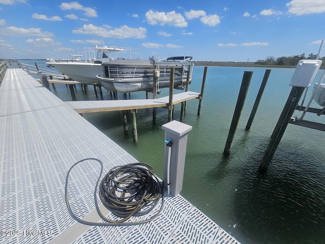 732 Avila Ave, Hampstead, NC 28443 - dock area with boat lift and a water view