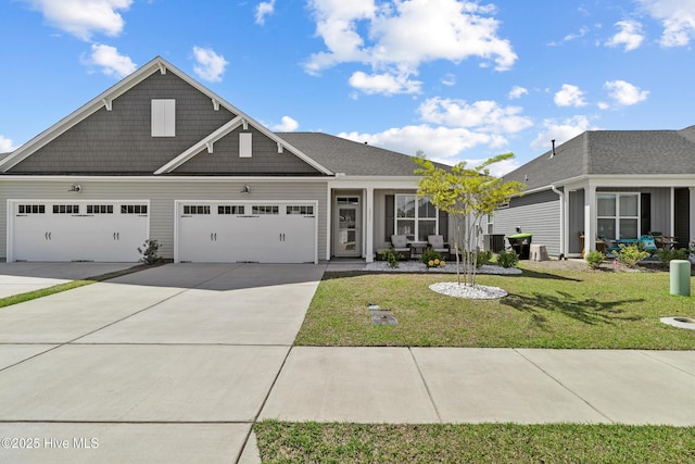 view of front facade featuring central AC, concrete driveway, a front yard, and a garage
