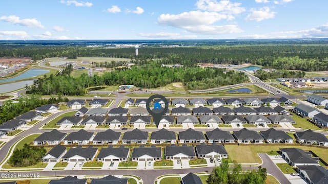 aerial view with a residential view and a water view