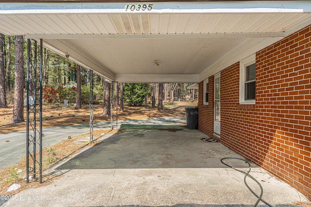 view of patio / terrace featuring an attached carport
