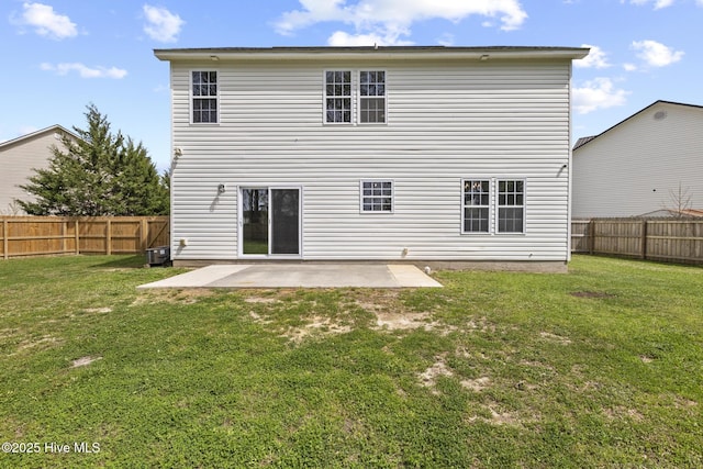 rear view of property with central air condition unit, a patio area, a fenced backyard, and a lawn
