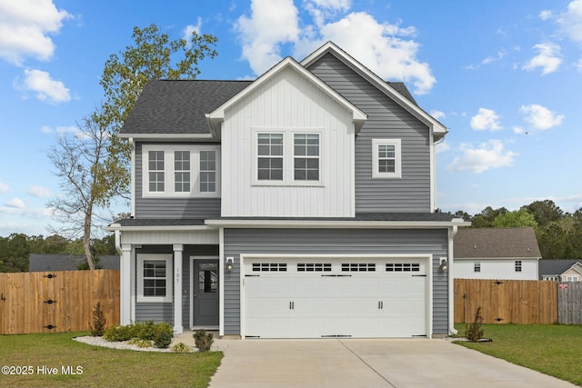 traditional-style house featuring board and batten siding, fence, an attached garage, a shingled roof, and concrete driveway