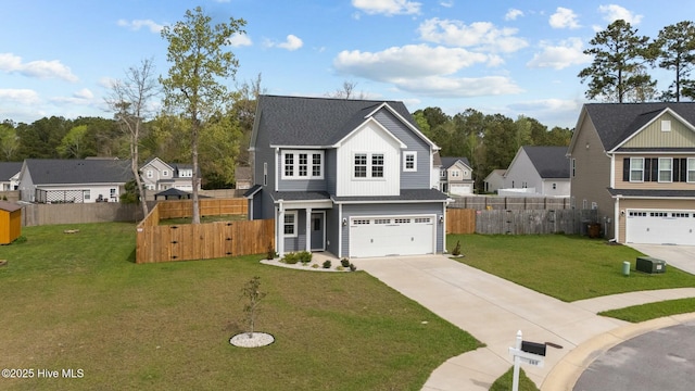 view of front of house with an attached garage, board and batten siding, fence, a residential view, and driveway