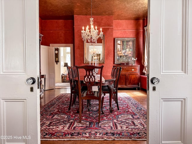 dining area featuring a chandelier