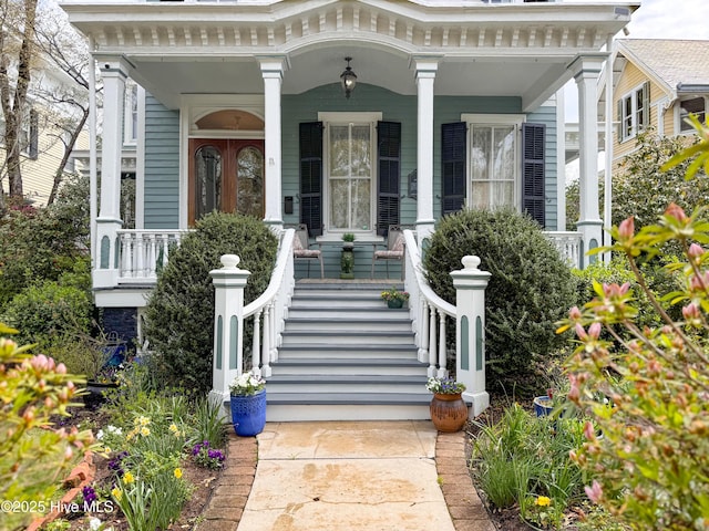 property entrance featuring a porch