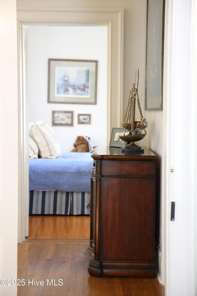 bedroom featuring wood finished floors