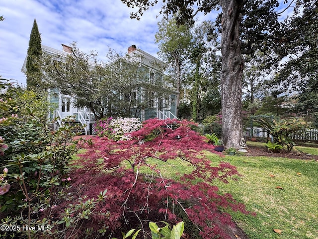 view of yard featuring fence