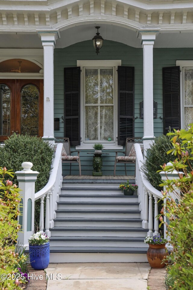 doorway to property with a porch