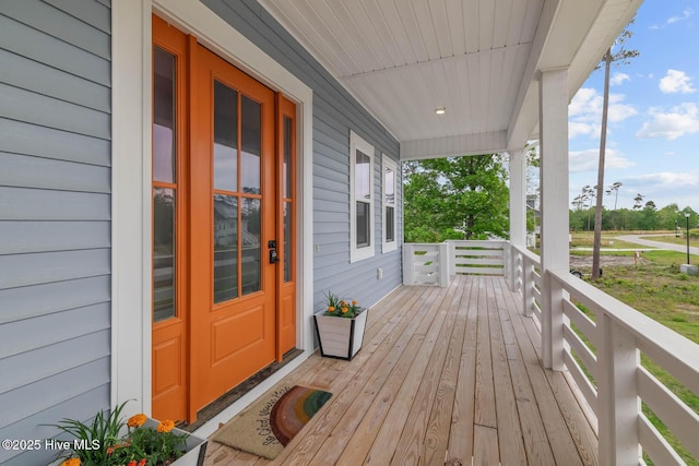wooden deck featuring a porch