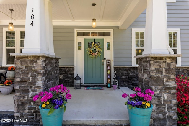 104 Plantation Dr, Southern Pines, NC 28387 - doorway to property featuring a porch and stone siding
