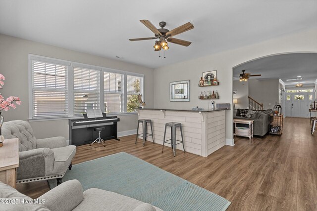 104 Plantation Dr, Southern Pines, NC 28387 - living area featuring plenty of natural light, a ceiling fan, and wood finished floors