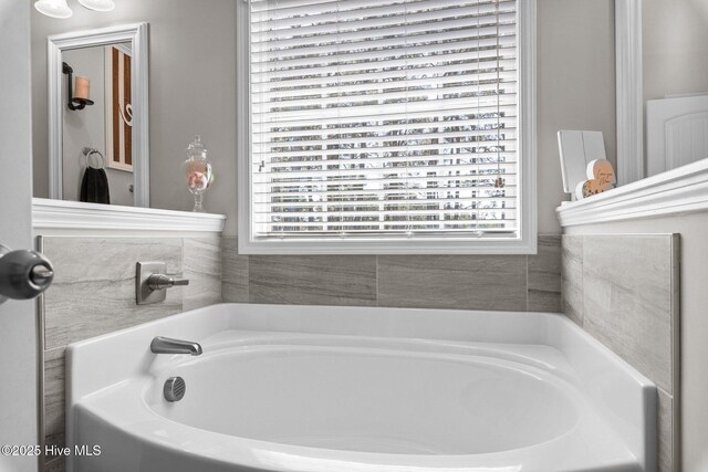 104 Plantation Dr, Southern Pines, NC 28387 - full bathroom featuring a garden tub and a wealth of natural light