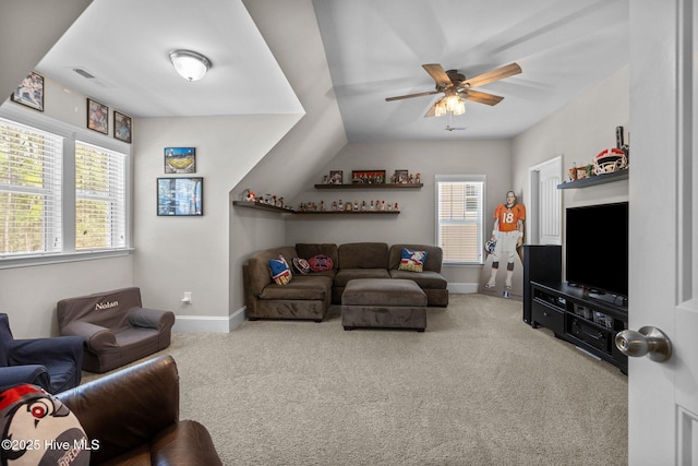 104 Plantation Dr, Southern Pines, NC 28387 - living room featuring baseboards, a ceiling fan, carpet flooring, and a healthy amount of sunlight