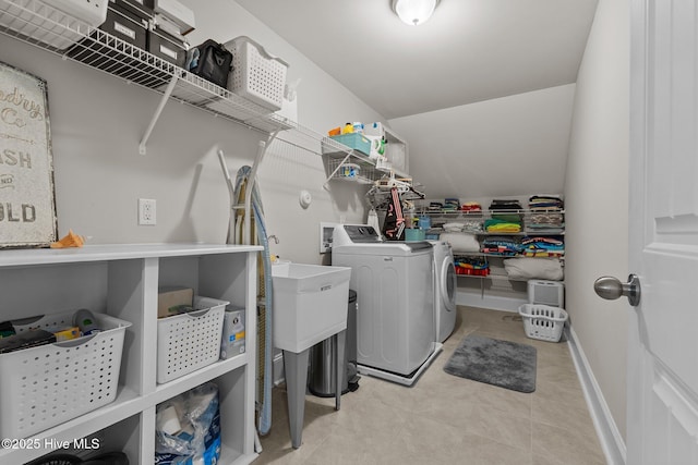 104 Plantation Dr, Southern Pines, NC 28387 - laundry room featuring washer and dryer, laundry area, and baseboards