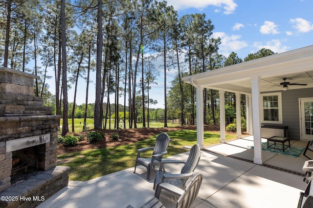 104 Plantation Dr, Southern Pines, NC 28387 - view of patio featuring an outdoor fireplace and ceiling fan
