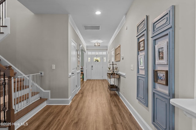 104 Plantation Dr, Southern Pines, NC 28387 - corridor featuring stairway, visible vents, crown molding, and wood finished floors