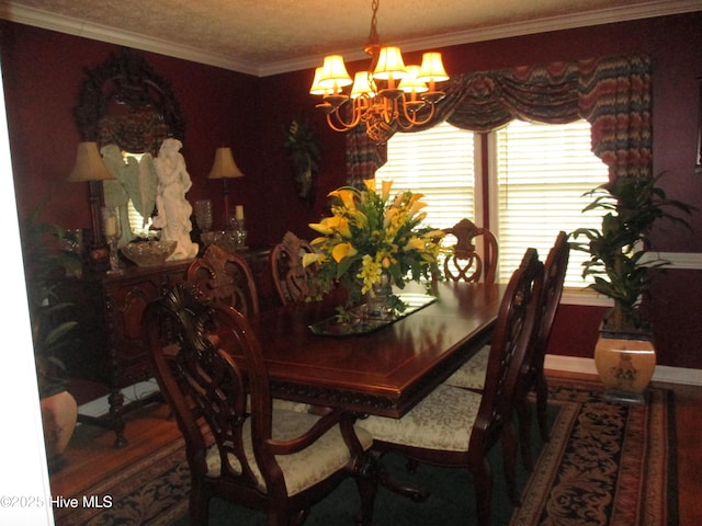 3550 Grainger Station Rd, Grifton, NC 28530 - dining area with a chandelier, crown molding, and baseboards