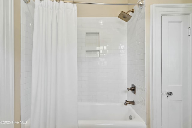 full bathroom with shower / bathtub combination with curtain