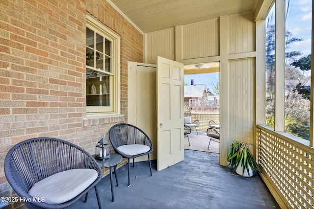 sunroom featuring a healthy amount of sunlight