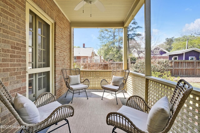 exterior space with a ceiling fan