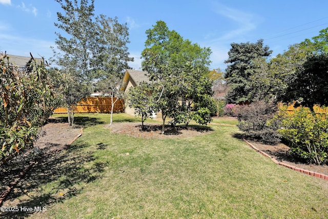 view of yard featuring fence