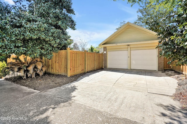 garage with fence