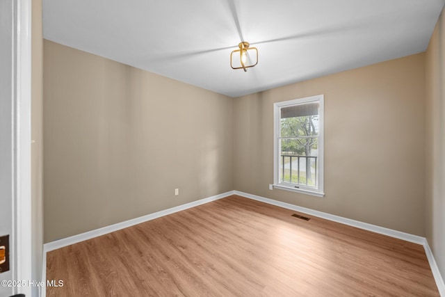 301 Pine Crest Rd, Trent Woods, NC 28562 - spare room featuring wood finished floors and baseboards