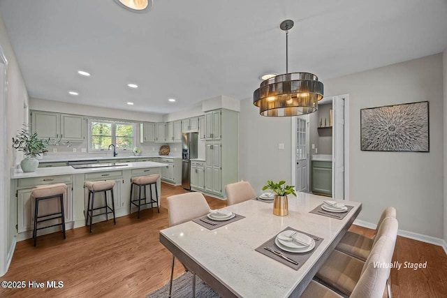 301 Pine Crest Rd, Trent Woods, NC 28562 - dining area with light wood-style flooring, recessed lighting, baseboards, and a chandelier