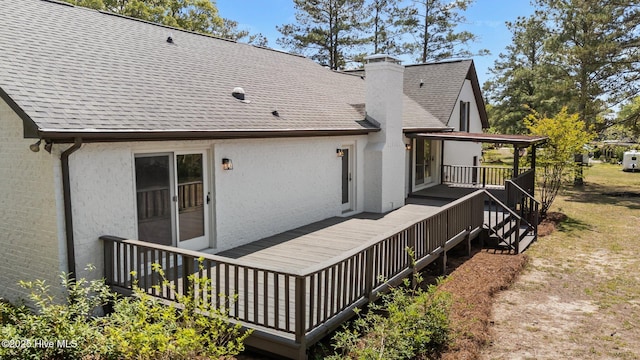 301 Pine Crest Rd, Trent Woods, NC 28562 - rear view of property with a shingled roof, a chimney, and a deck