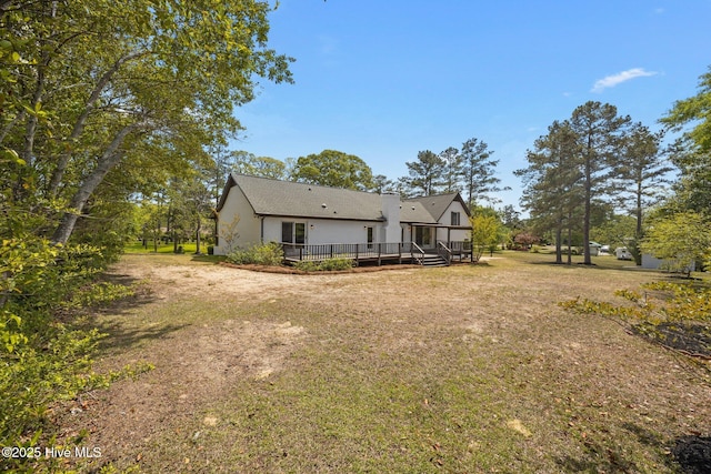 301 Pine Crest Rd, Trent Woods, NC 28562 - rear view of property with a deck, a yard, and stucco siding
