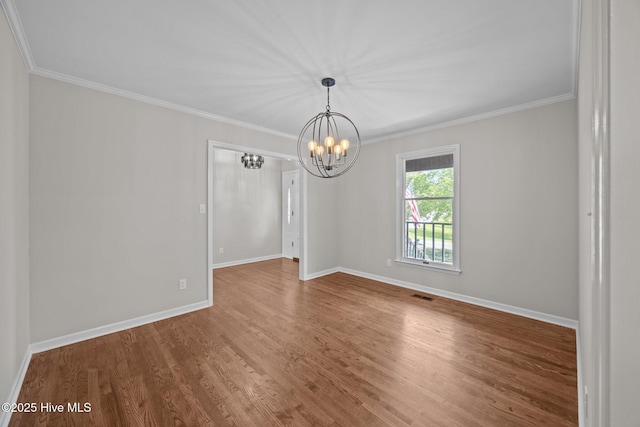 301 Pine Crest Rd, Trent Woods, NC 28562 - unfurnished room with a chandelier, wood finished floors, baseboards, and crown molding