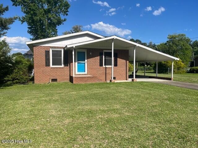 117 Brookfield Dr, Wilmington, NC 28405 - view of front facade with an attached carport, a front lawn, brick siding, driveway, and crawl space