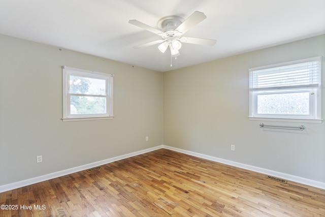 117 Brookfield Dr, Wilmington, NC 28405 - empty room featuring light wood finished floors, baseboards, and ceiling fan