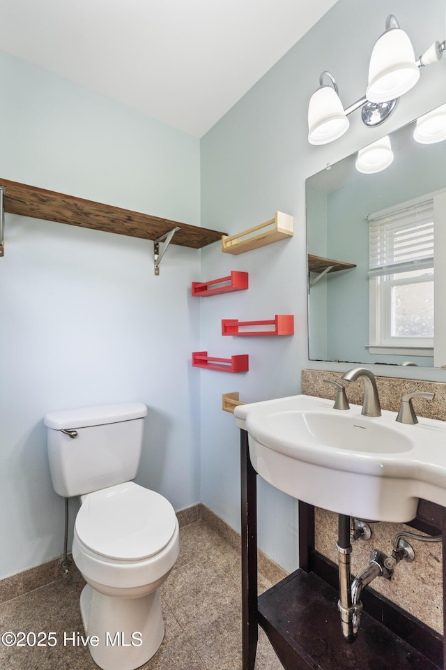 117 Brookfield Dr, Wilmington, NC 28405 - bathroom featuring baseboards and toilet
