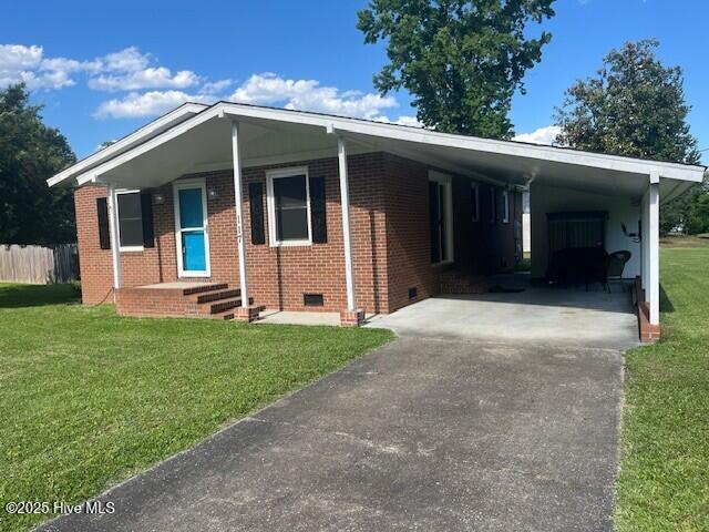 117 Brookfield Dr, Wilmington, NC 28405 - view of front of property featuring driveway, crawl space, an attached carport, and brick siding