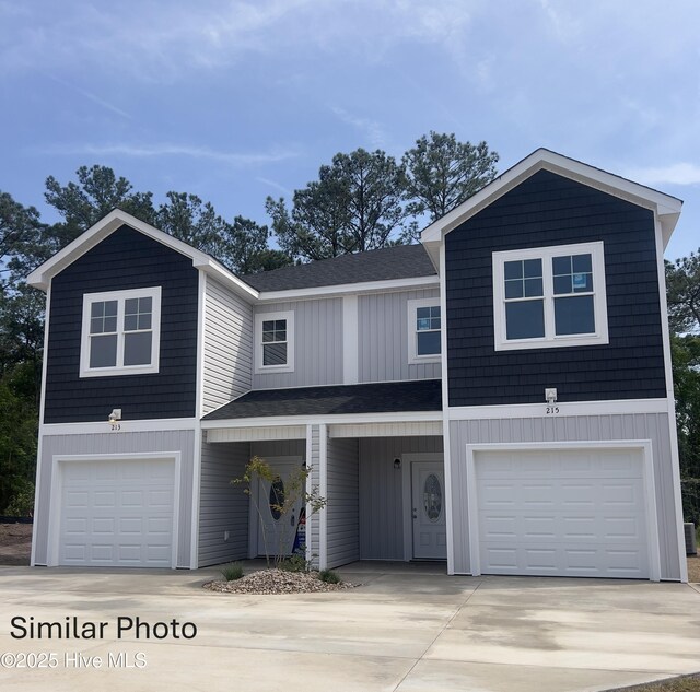 221 Holly Sands Loop, Holly Ridge, NC 28445 - view of front of property featuring a shingled roof, concrete driveway, and an attached garage