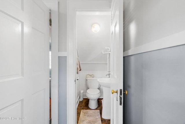 bathroom featuring toilet
