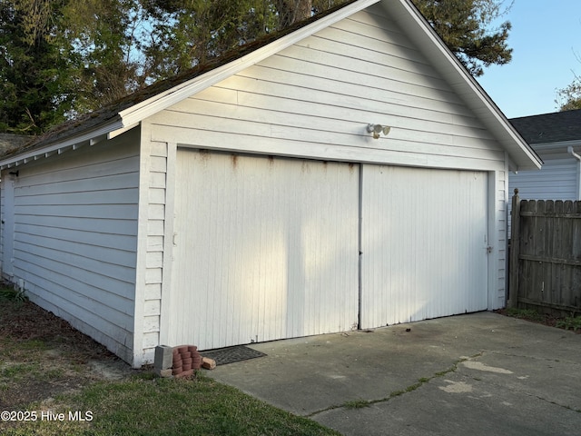 detached garage with fence