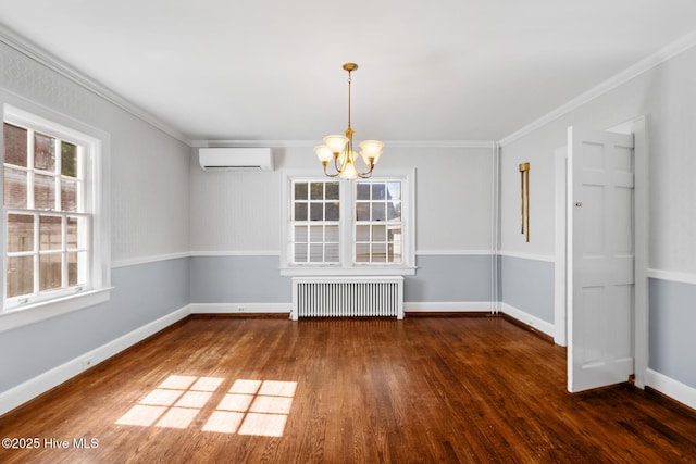 unfurnished dining area with radiator, wood finished floors, a notable chandelier, and a wall mounted air conditioner