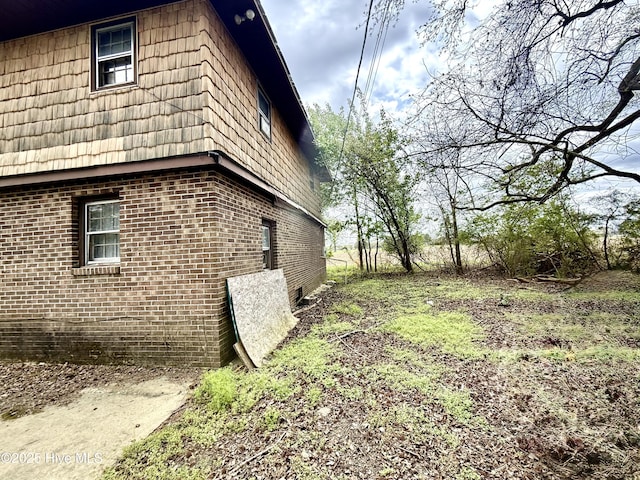610 S Main St, Roxobel, NC 27872 - view of home's exterior with brick siding and mansard roof