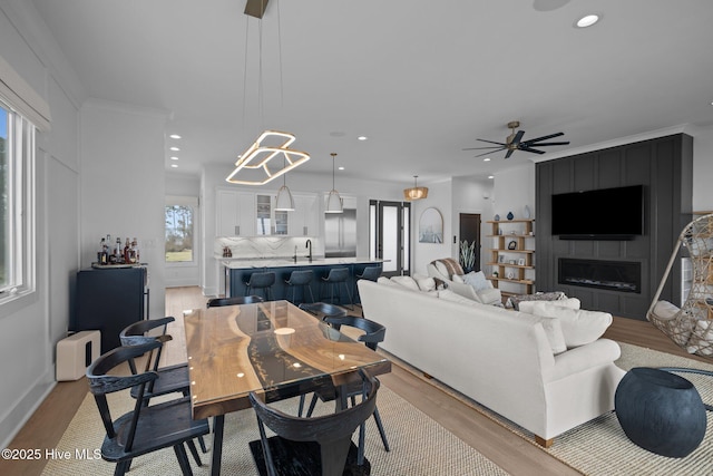 546 S Brightleaf Dr, Minnesott Beach, NC 28510 - dining room with ceiling fan, recessed lighting, and light wood-style floors