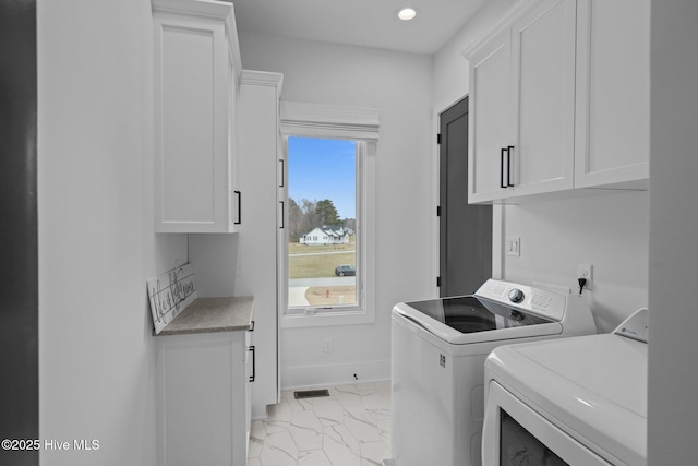 546 S Brightleaf Dr, Minnesott Beach, NC 28510 - laundry room featuring washing machine and dryer, marble finish floor, baseboards, cabinet space, and recessed lighting