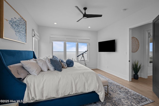 546 S Brightleaf Dr, Minnesott Beach, NC 28510 - bedroom featuring baseboards, light wood-style flooring, recessed lighting, and a ceiling fan