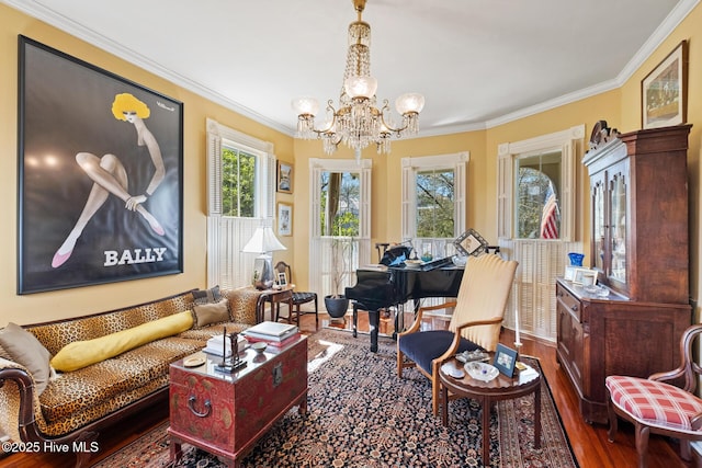 211 S 2nd St, Wilmington, NC 28401 - living area featuring a chandelier, wood finished floors, and ornamental molding